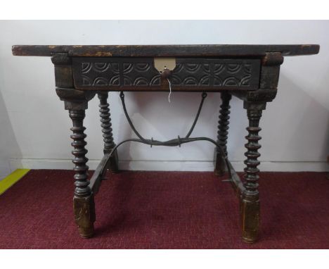 An 18th century Spanish walnut side table, with single drawer, raised on turned bobbin legs joined by iron stretcher, H.68 W.