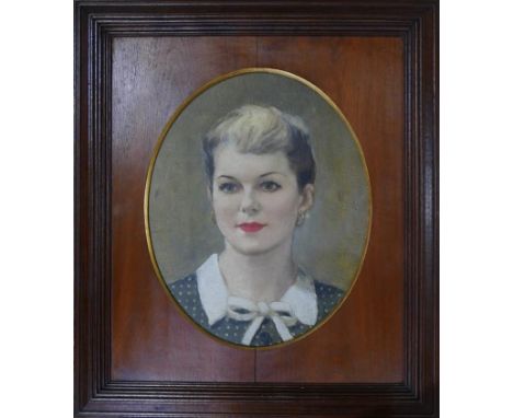 Mid 20th century school, head and shoulder portrait of a lady, oil on canvas laid down, feigned to oval, in oak frame, 36 x 2