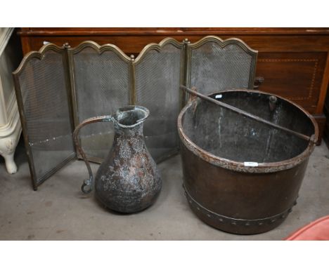 Antique rivetted brass log basket with iron handle to/w Middle Eastern engraved copper jug and folding brass fire screen&nbsp