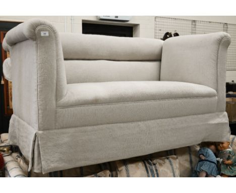 An Edwardian two seater sofa on tapering square supports and casters, cream linen fabric, 150 cm wide x 80 cm x 80 cm 