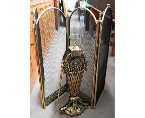 A pierced brass 'peacock' fire screen in cast neo-classical frame to/w four-panel brass and wire mesh panelled fire screen (2