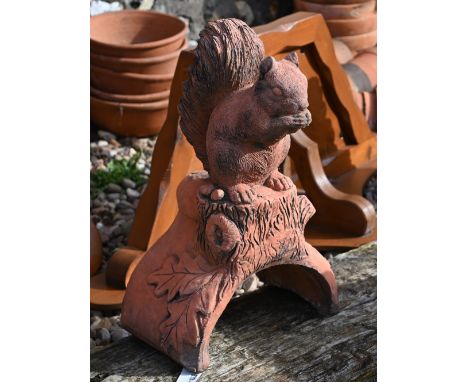 A cast terracotta squirrel ridge tile 