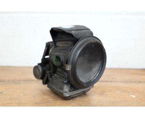 An antique Lucas Ltd Silver King bicycle lamp with paraffin burner 