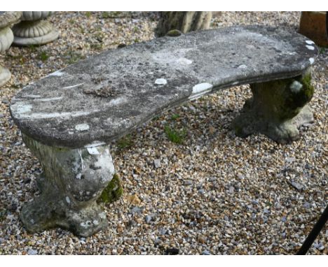 A weathered cast stone three piece garden bench 