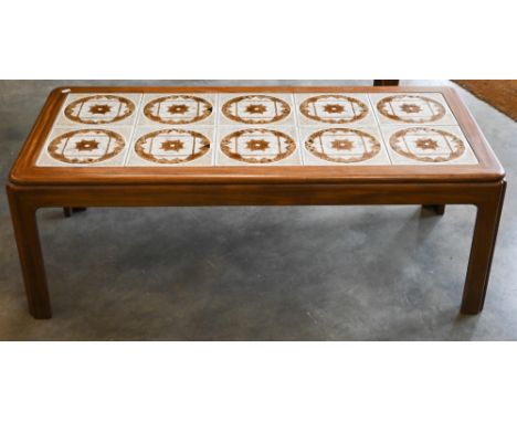 A 1970s teak tile-top coffee table, possibly by Nathan, 114 cm wide x 50 cm deep x 40 cm high 