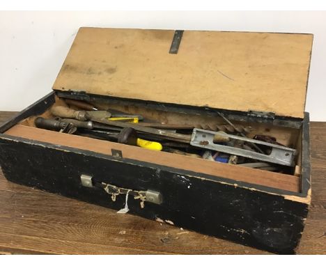 A wooden tool box with a large quantity of  tools