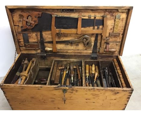 Victorian pine carpenters trunk with a large selection of tools