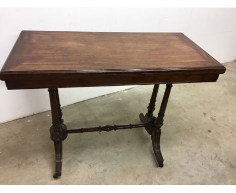 Mahogany swivel top card table on turned legs and castorsW:99cm x D:50cm x H:74cm.                Extended.W:99cm x D:99cm x 