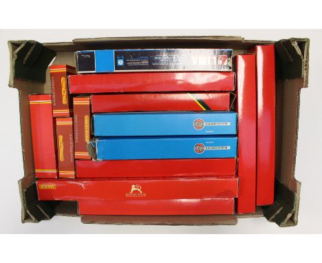 OO GAUGE: One box of assorted Hornby boxed rolling stock and coaches, together with a Lima boxed Diesel locomotive.