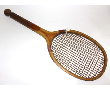 TENNIS: An Edwardian, 1920's lawn tennis racket by George Bussey, "Tournament Light 3" stamped "G.G B & Co London, ball-tail 