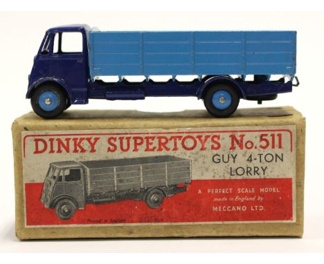 DINKY: A boxed Dinky Supertoys Guy 4-Ton Lorry, 511, in early cardboard box, dark blue cab and chassis.