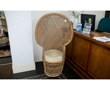 Cane Peacock Style Chair in natural colour with upholstered cream seat, measures approx 35" height and 31" width. On circular