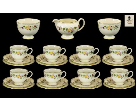 Wedgwood 'Mirabelle' Tea Service comprising Milk Jug, two Sugar Bowls, 8 Tea Cups, 8 Saucers, 7 Side Plates, Large Sandwich/C