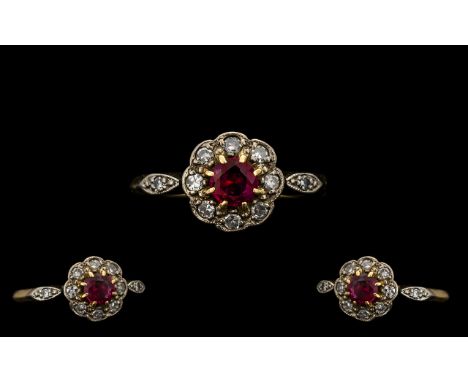 Edwardian Period 18 ct Gold - Attractive Ruby and Diamond Ring in a flowerhead setting. Hallmark Birmingham 1909. Ring size (