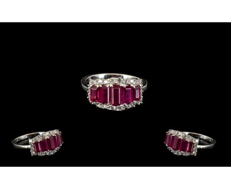 Ruby and Zircon Graduated Band Ring, comprising five graduated baguette cut rubies of good and well matched colour, the large