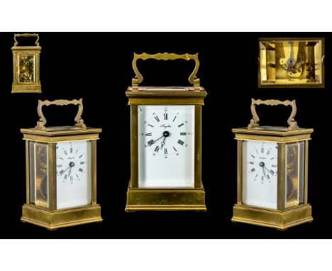 French Nice Quality 11 Jewell's 8 Day Brass Carriage Clock - features white porcelain dial visible lever escapement and bevel