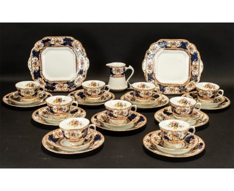 English Bone China 'Bon' Part Tea Service comprising 9 cups, 10 saucers, 10 small sandwich/cake plates, two large sandwich/ca