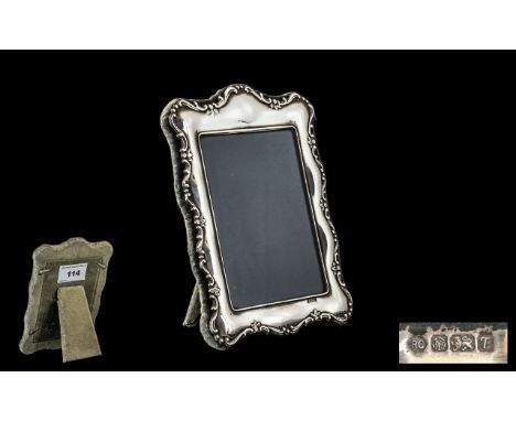 Silver Photo Frame. Lovely design and shape, hallmarked Sheffield 1993, maker ( R C ), 5.5 by 4 inches, please see accompanyi