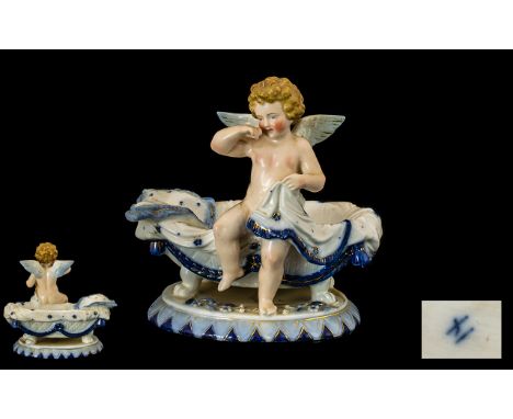 Dresden Porcelain Cherub Dish in the shape of a bath tub, ideal for soap or trinket dish, circa 1900s.  6.5" high, 7" wide.  