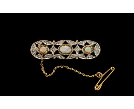 Ladies 9ct Two Tone Gold Attractive Opal and Diamond Set Brooch with Safety Chain. Full Hallmark for 9.375. The Opals of Good