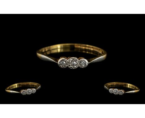 18ct Gold and Platinum Three Stone Diamond Dress Ring. Ring size R.