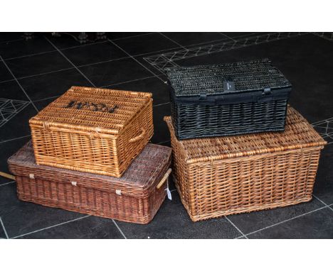 Four Vintage Large Wicker Baskets ideal for decorative/storage purposes. comprising three natural colour baskets, and one bla