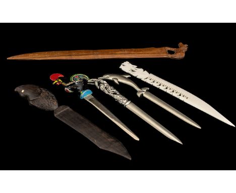 Collection of Vintage Paper Knives with handles depicting animals and birds, in carved, metal and wood.  Please see images.