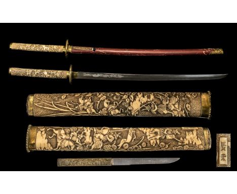 Large Decorative Japanese Samurai Sword and Scabbard with a fine gilt metal shuba; the blade engraved with a dragon; the hilt