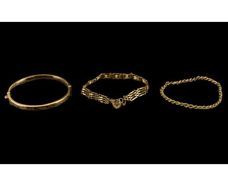 Three Pieces Of 9ct Gold Jewellery To Include A Hinged Bangle With Safety Chain, The Front With Floral Engraved Decoration, F