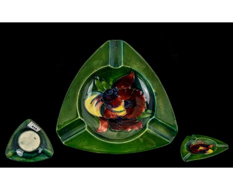 Moorcroft Vintage Triangular Shaped Ashtray in forest green with Orchid pattern. Moorcroft stamped to base. Please see images