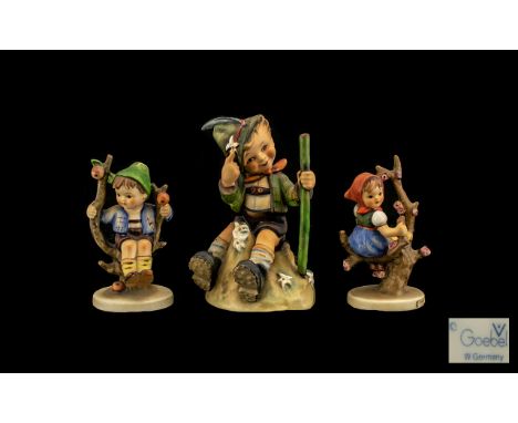 Hummel Figures ( 3 ) In Total. 1/ Mountaineer 5.5 Inches - 13.75 cm. 2/ Apple Tree Boy. 3/ Apple Tree Girl. All Figures are I