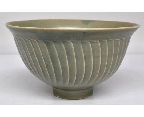 David Leach celadon green bowl with fluted decoration to the outside. Diameter approx 16.5cm. Impressed mark to the base.