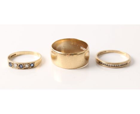 A hallmarked 9ct yellow gold diamond half eternity ring, ring size O, together with a hallmarked 9ct yellow gold sapphire and