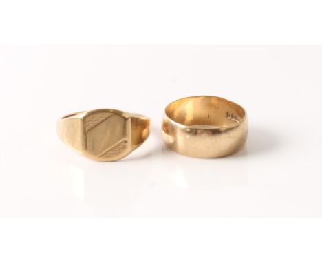 A hallmarked 9ct yellow gold signet ring and a hallmarked 9ct yellow gold plain wedding band.