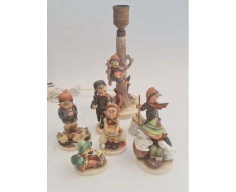 Seven Goebel Hummel figures to include table lamp.