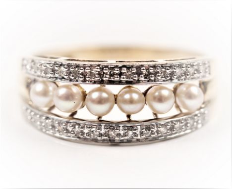 A hallmarked 9ct yellow gold pearl and diamond ring, set with a central row of pearls flanked to either side with a row of si