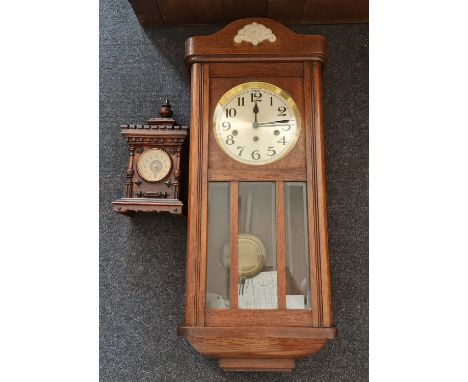 A black slate mantle clock small gothic style clock and wall clock.
