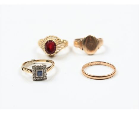 A hallmarked 9ct rose gold signet ring, a sapphire and diamond cluster ring, stamped 9ct, a red glass single stone ring, indi