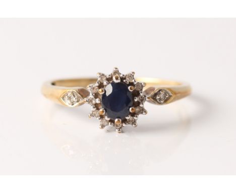 A sapphire and diamond cluster ring, stamped 9k, ring size Q