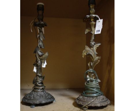 A pair of 19th Century French ormolu candle holders (adapted for lighting) (sold as parts). 