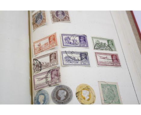 A ‘Movaleaf’ stamp album of World Wide stamps and folder of loose stamps and envelopes  