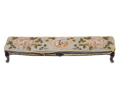 A fireside stool, 19th century, the tapestry top with oak leaf motifs and three cartouches each with bead decoration depictin