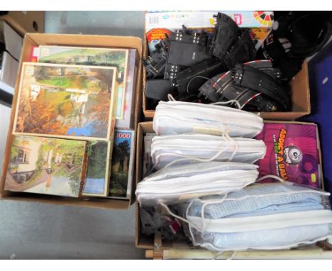 A mixed lot to include vintage jigsaw puzzles, toys, crafting equipment, unused retail stock, baby blankets and similar (3)