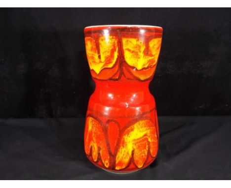 Poole Pottery - a Poole Pottery Delphis Range vase shape No. 84, signed to the base, approximately 23 cm (h). Estimate £20 - 