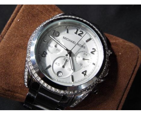 Michael Kors - a Michael Kors wristwatch with multiple dials, stone set, fascia with Michael Kors logo marked to strap, inscr