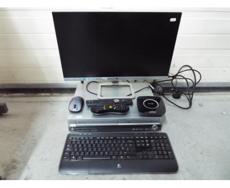 A lot to include a 24inch HP ultra slim flatscreen monitor, a Panasonic DVD player and recorder, a You View box and similar 