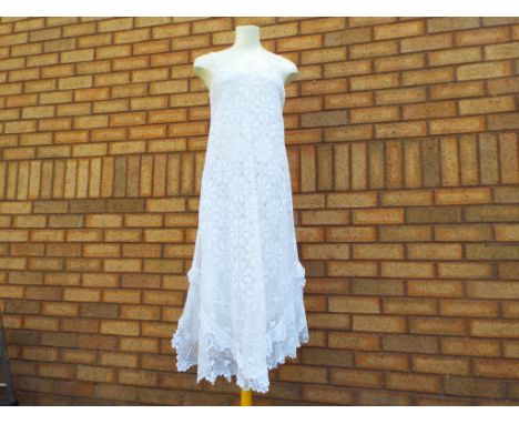 Vintage Clothing - a good quality cotton lined broderie anglaise dress with frilled detailing to the bottom, 'A' line design 