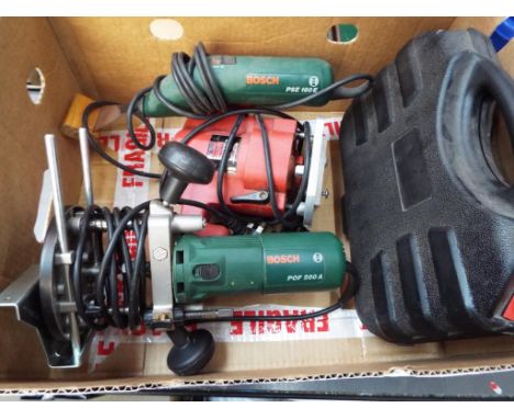 A quantity of power tools, including Bosch POF 500A router, a Powerdevil router, a Bosch PSE180E scraper and a Performance 14