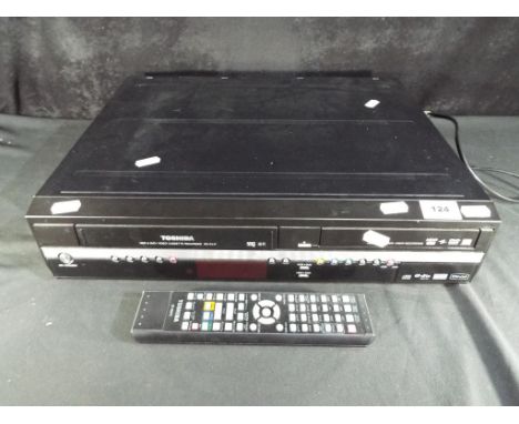 Toshiba RD-XV47 VHS to DVD recorder with original remote, Est £20 - £40.