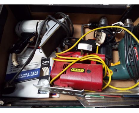 A small quantity of power tools to include Bosch drill and similar.